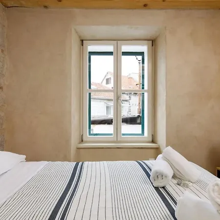 Modern Design In Old Stone House With A Garden In The Center Of Villa