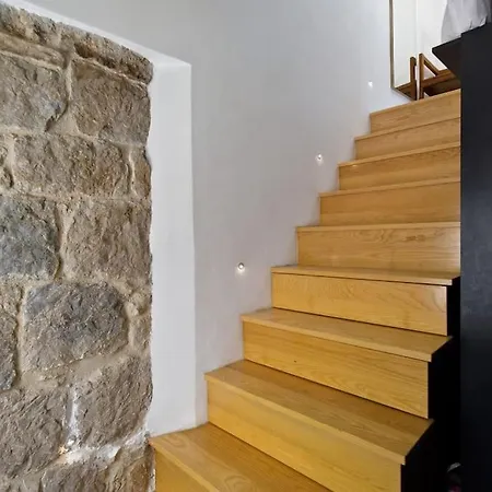 Modern Design In Old Stone House With A Garden In The Center Of