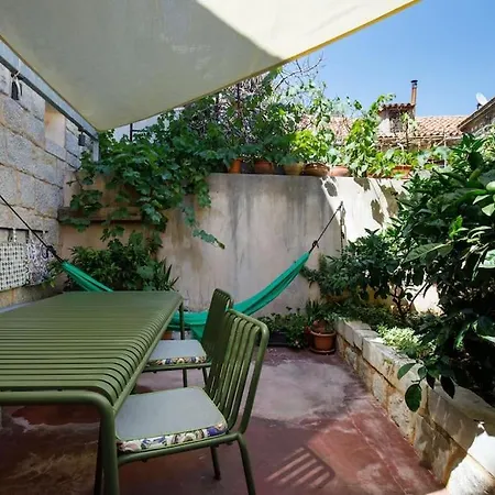Modern Design In Old Stone House With A Garden In The Center Of * Split