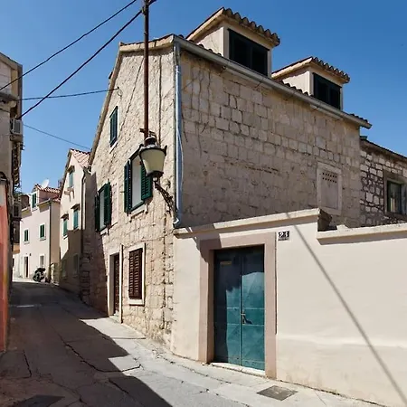 Modern Design In Old Stone House With A Garden In The Center Of