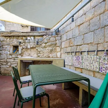 Modern Design In Old Stone House With A Garden In The Center Of Villa