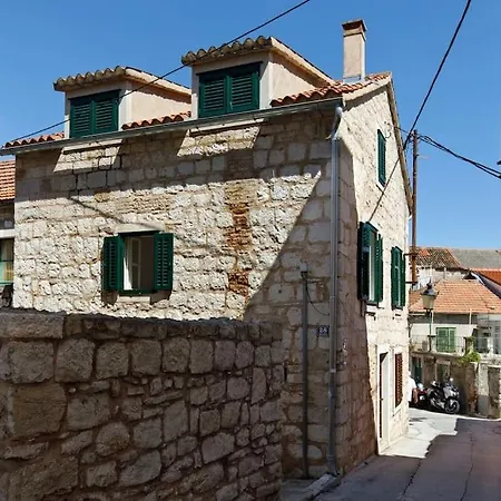 Modern Design In Old Stone House With A Garden In The Center Of